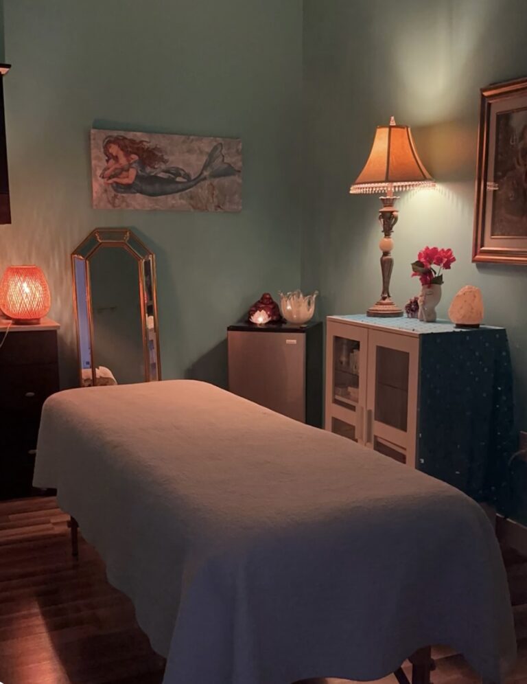 Cozy massage room with soft lighting