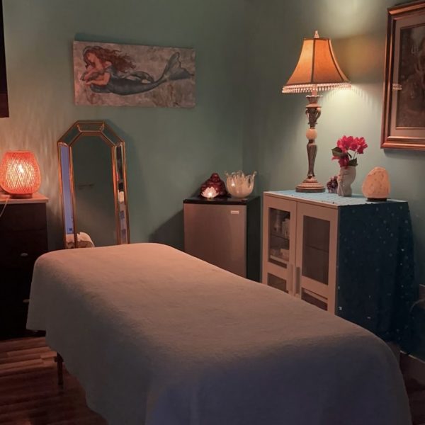 Cozy massage room with soft lighting